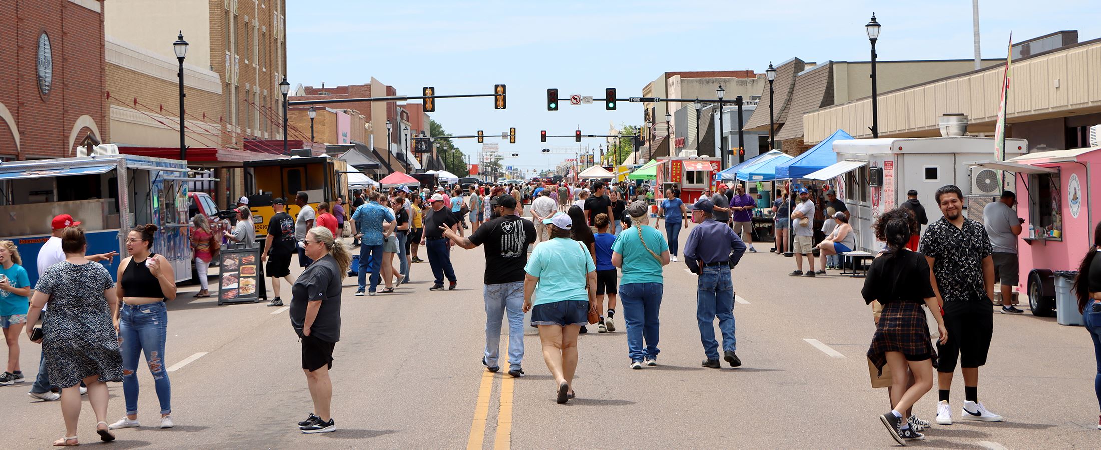 People visiting Downtown Liberal