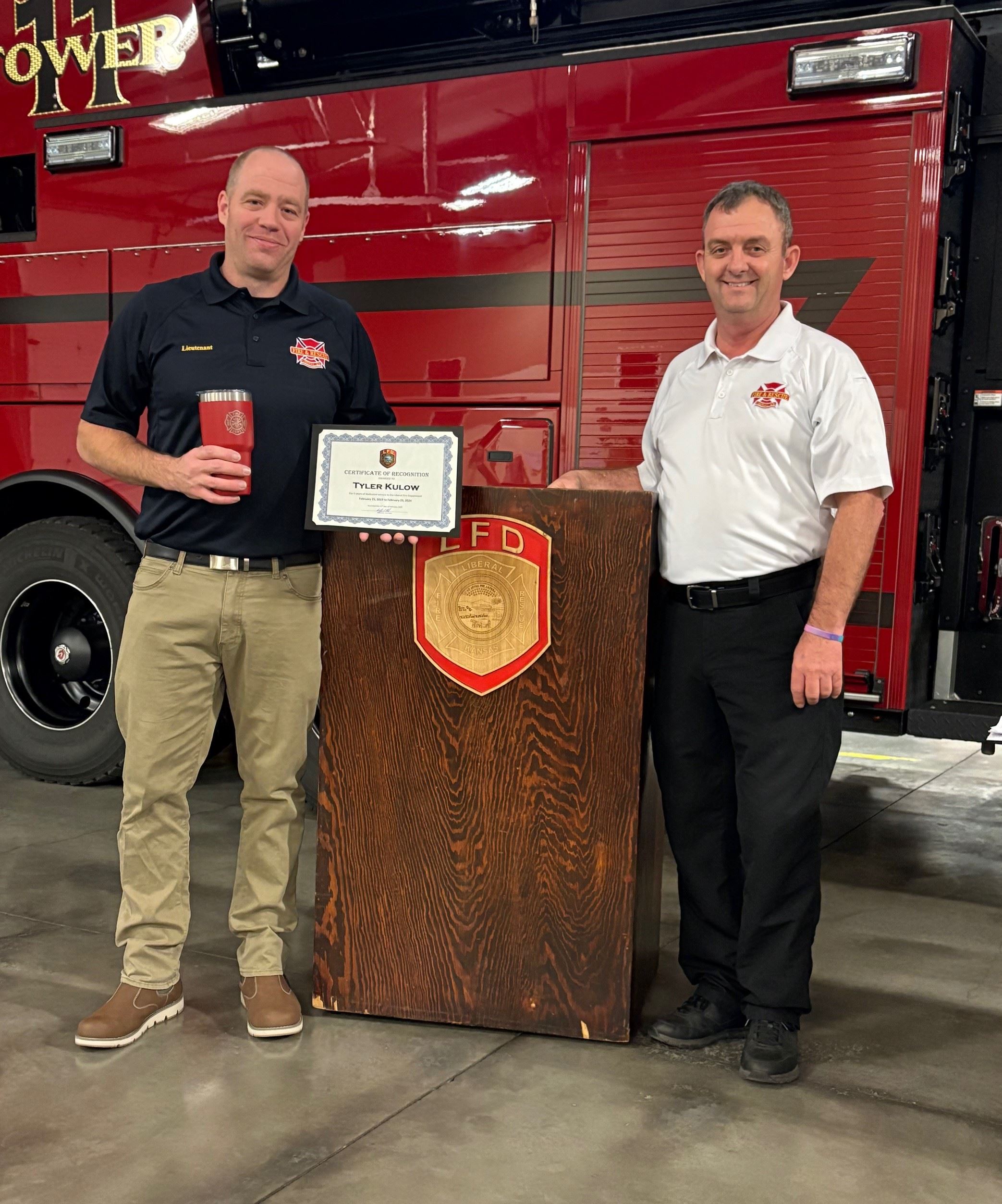 Tyler Kulow accepts 5 Yrs Service Award