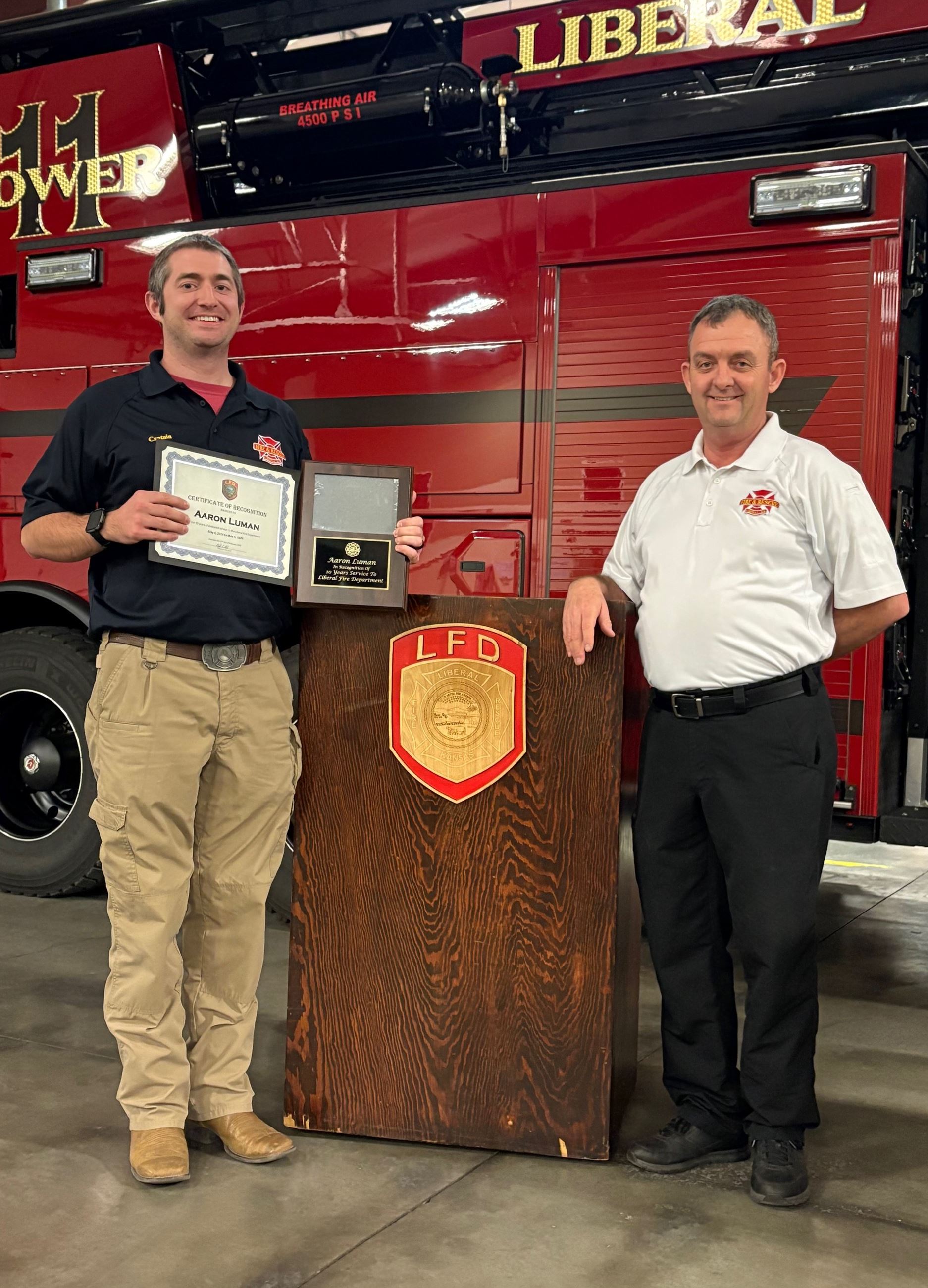 Aaron Luman accepts 10 Yrs Service Award